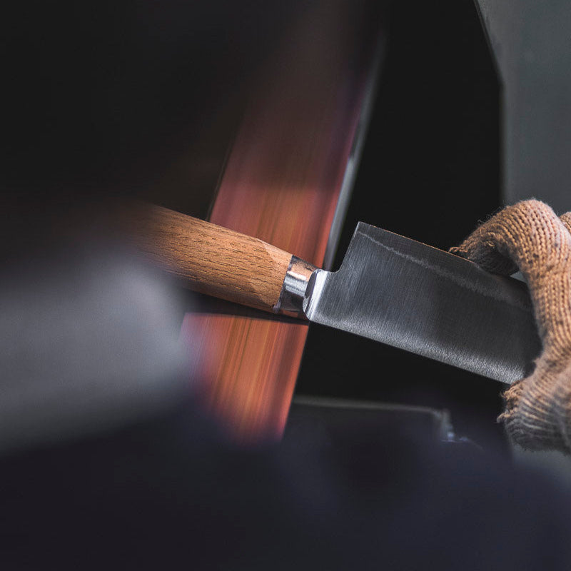 Knife Being Sanded